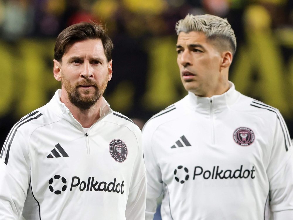 Inter Miami CF players in Polkadot-branded training tops before a match