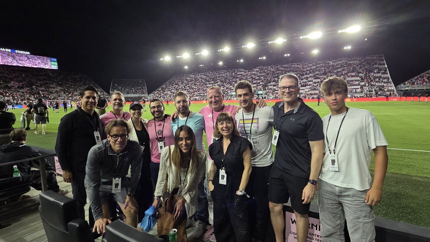 Chris Wade and the Polkadot group pitchside at Chase Stadium