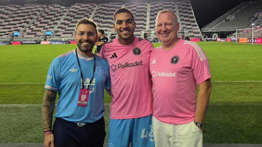 Sal Esposito and Chris Wade pitchside with an Inter Miami CF player in the Polkadot jersey