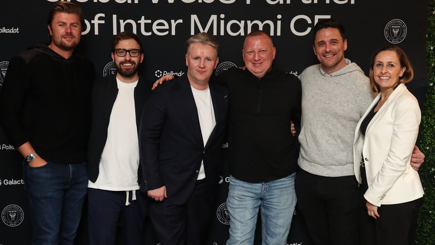 The Polkadot team at the Global Web3 Partner of Inter Miami CF backdrop